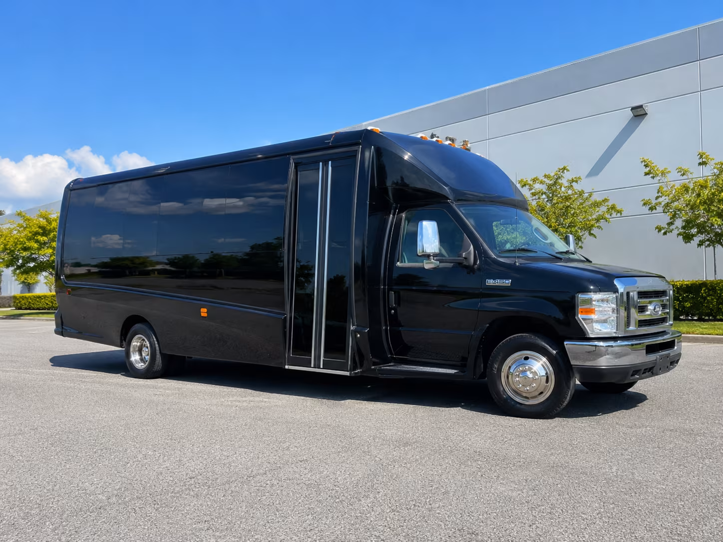 Group beside a Mercedes Sprinter limo in Corpus Christi